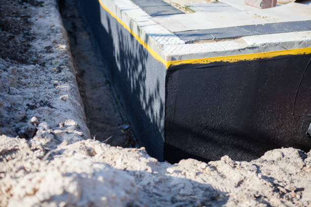 Professional Waterproofing technician working in Roan Mountain, TN